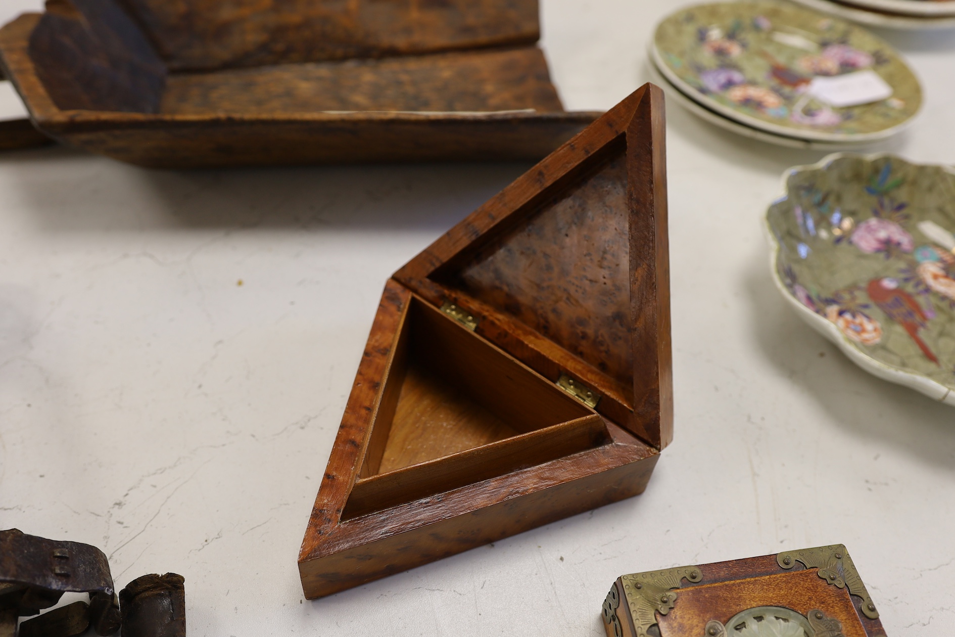 A wrought iron animal trap, a Durham Cathedral style door knocker back plate, a diamond tipped glass cutter and a group of Treen, tallest 42.5cm. Condition - fair to good